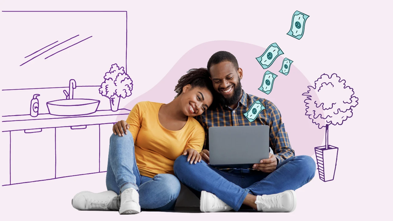 A couple finishing an online loan application to fund their home improvement project.