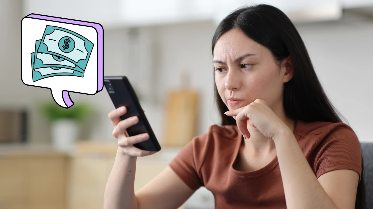 A woman with long brown hair and a pensive expression looks at her phone.
