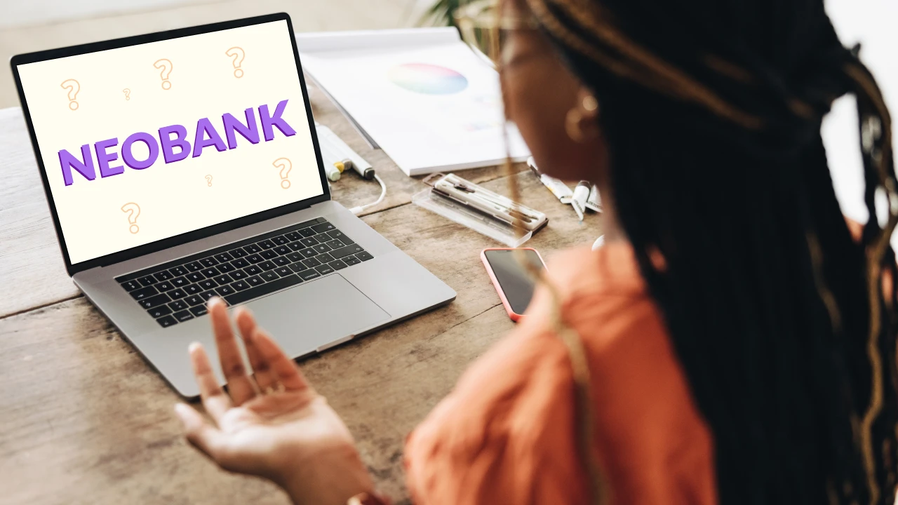 Woman researching neobanks on her laptop. 