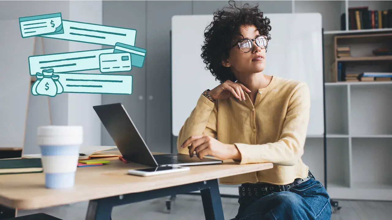 Woman researching types of savings accounts on a laptop. 