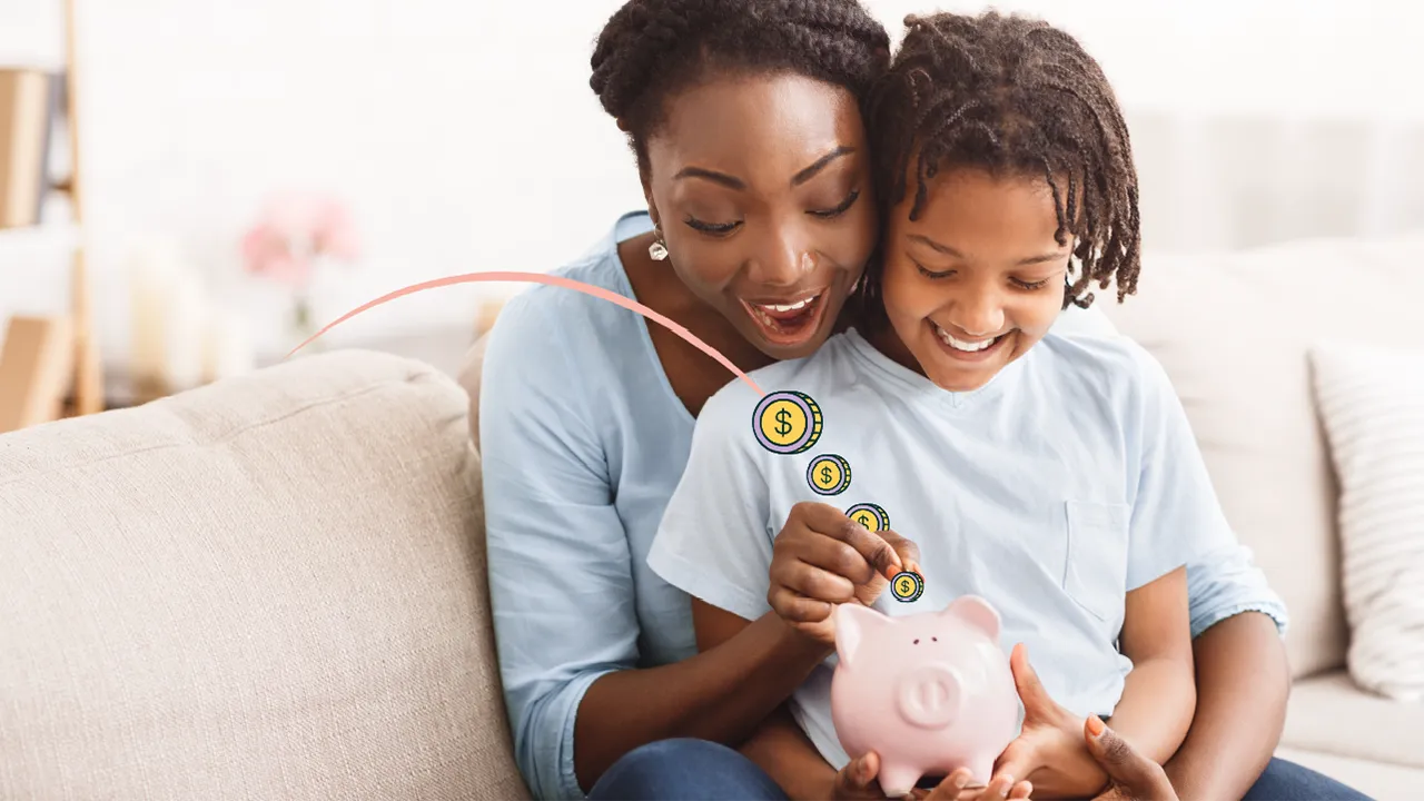 Child sitting on mom’s lap putting coins into a piggy bank. 